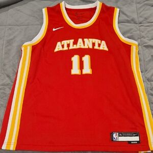 Nike Women's Red Jersey with Yellow Accents